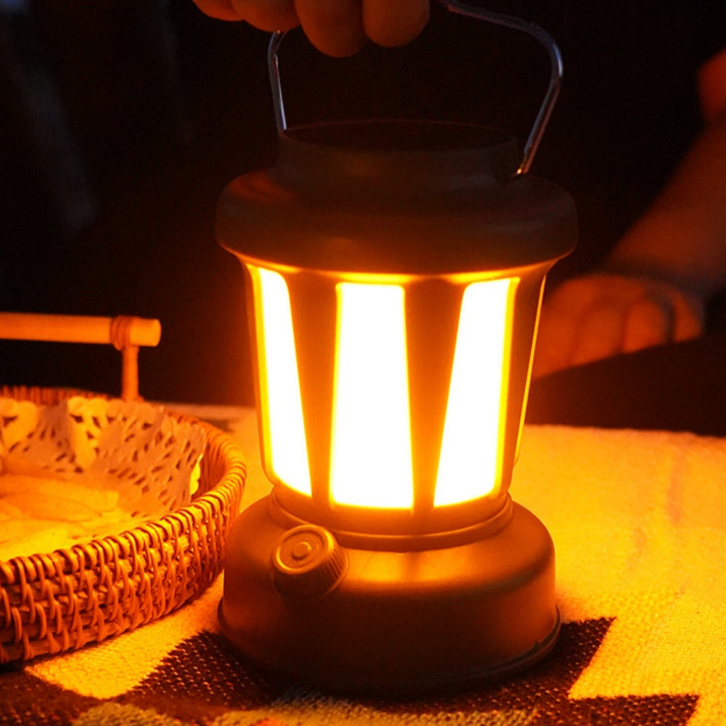 Solar Rechargeable Camping Lantern – Vintage LED Tent Light for Camping & Emergencies Lit on a table